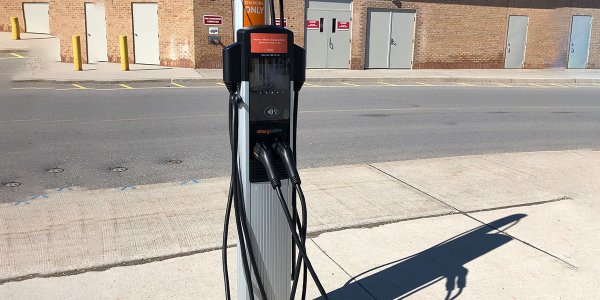 ev-charger-stand-green-front-full-plus-toronto-outdoor-advance-net-electric